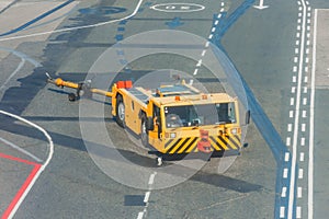 Tow truck vehicles trailer for puch back plane at the airfield