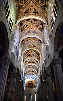 Towards the altar, the frescoed vault of the central nave of the cathedral of Lucca. photo