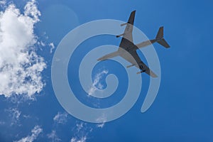 Towards the sky, a U.S. Air Force military transport aircraft transports cargo at high speed