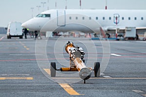 Towbar for pushback airplanes at the airport apron