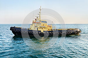 Towboat in sea port photo