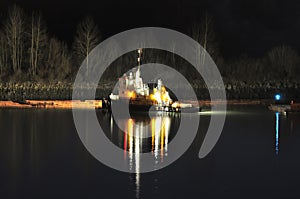 Towboat working at night photo