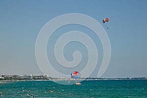 Towed parachute in Turkey on the shores of the mediterranean sea, during the covid 19 pandemic