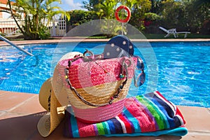 Towel and bathing accessories near pool