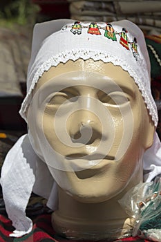 Towel with Bulgarian folk motives on a mannequin. Town of Kyustendil.