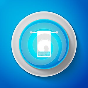 Towel on a hanger icon isolated on blue background. Bathroom towel icon. Circle blue button