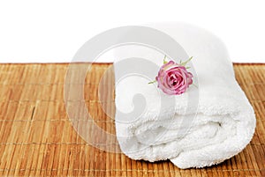 Towel with pink rose