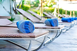 towel pool on bed around swimming pool in hotel resort