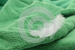 Towel cotton with bird feather photo