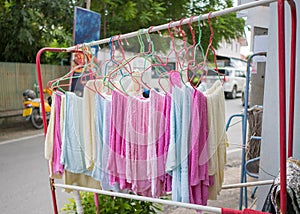 The towels dry clothes in the sun at drying rack