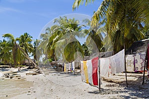 Towels drying on the sun on a tropical beach