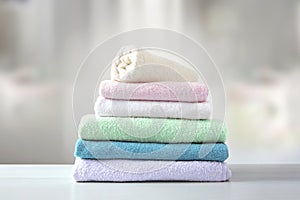 Towels folded stack.Colorful linen.Household. Laundry pile.Shower items. Hygiene concept