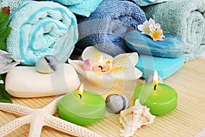 Towels, soaps, flowers, candles