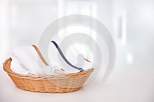 Towels whith strips in a basket