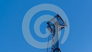 A tower for amplifying the cellular signal against the blue sky