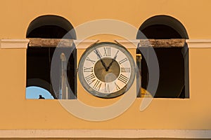 Tower with an ancient clock made by spanish people in 1100 year After Christ