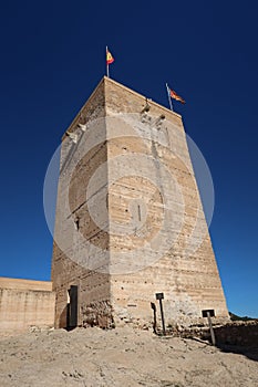 Tower of the Arab Castle of Almohad origin from the 12th century in Biar, Alicante, Spain