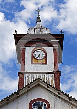 Tower of baroque church in historical city of Serro, Brazil photo