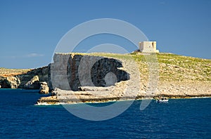 Tower bastioned on island Comino in Mediterranean Sea, Malta