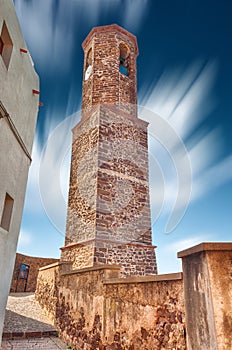 tower in the beautiful alley of castelsardo old city