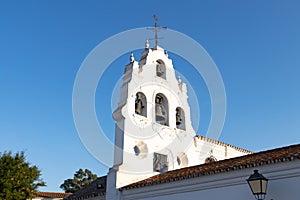 Tower bell of sanctuary Virgen de la Cinta, patron virgin of huelva since 1586. church on El Conquero hill in Huelva, Andalusia photo