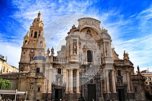 Tower bell, sculptures and carved stone details of the Cathedral of Murcia