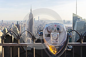 Tower binoculars facing Manhattan skyline in New York City