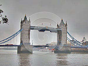 Tower bridge and dark cloudy sky