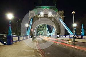 Tower Bridge entrance perspective at night, London