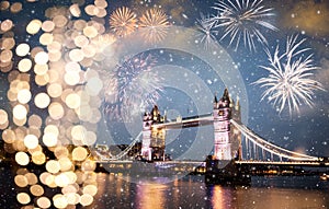 tower bridge with fireworks celebration of the New Year in London UK