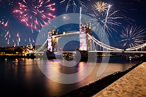 tower bridge with fireworks, celebration of the New Year in London, UK