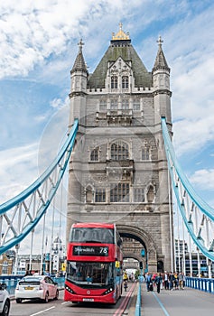 Tower Bridge and the iconic London bus in London, UK