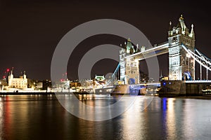 Tower Bridge in London at night over the Themse River