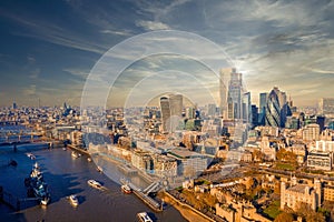 Tower Bridge in London, the UK. Bright day over London. Drawbridge opening.