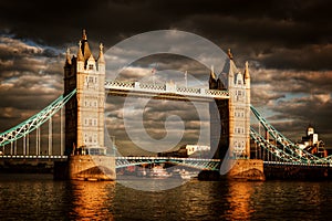 Tower Bridge in London, the UK. Dramatic stormy and rainy clouds