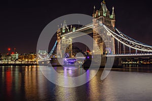Tower Bridge in London, UK at night time