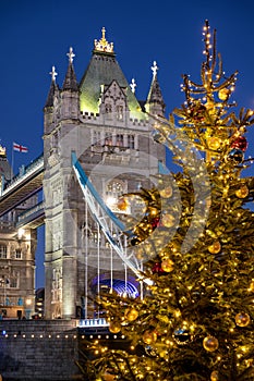 The Tower Bridge of London, United Kingdom, with a Christmas tree