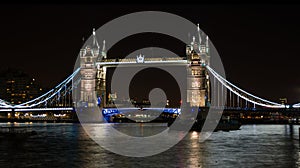 Tower Bridge on River Thames London UK at night