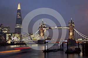 Tower Bridge and The Shard in London at Night with traffic trail