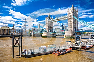 Tower Bridge and Thames river waterfront in London view