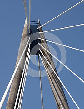 Tower and cables on the marine way suspension bridge in southport merseyside against a blue summer sky