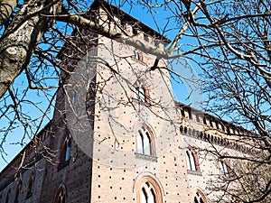 tower Castello Visconteo in Pavia city in spring photo