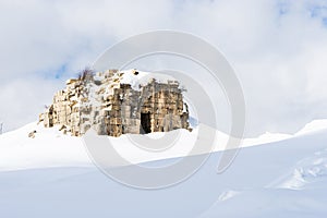 Tower of Caudius covered in snow during winter, Faqra Roman ruins, Lebanon photo