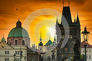 Tower of Charles bridge in Prague at sunrise, Czech Republic