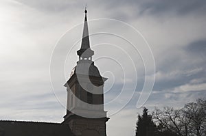 The tower of the church captured agaist sunlight