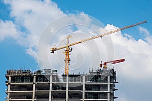 Tower crain construction building in blue sky