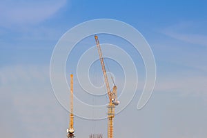 Tower crain construction building in blue sky