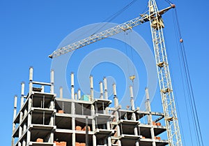 Tower Crane, building construction site with contractor on the