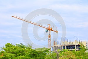 Tower crane in Construction buildings the city on sky background with copy space add text