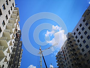 tower crane at the construction site. Construction of panel houses